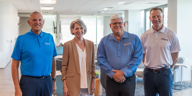 From left to right: Jeff Meshey (President & CEO), Ron Amstutz (Executive Vice President), and Cathy Graham (Executive Vice President) smiling for the camera.